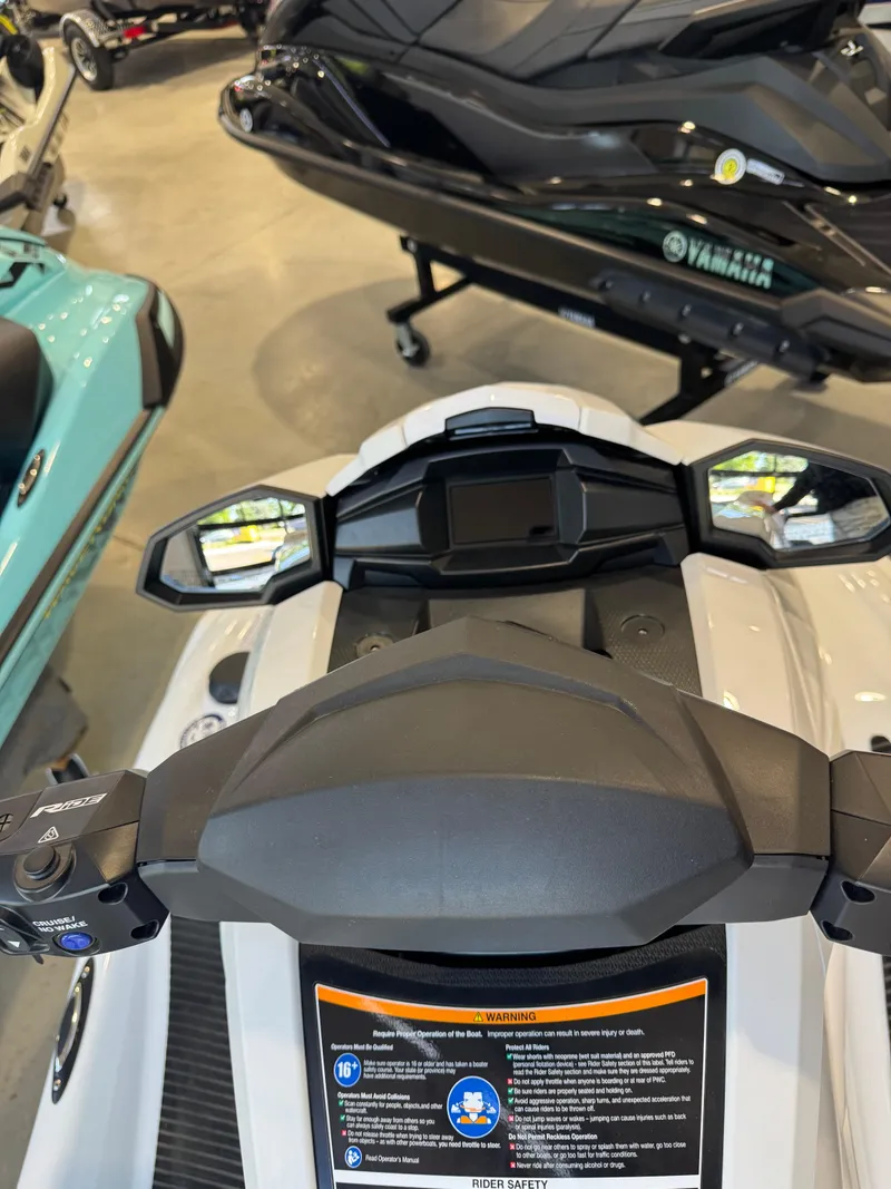 Slide: The Image of 2025 Yamaha WaveRunner VX Cruiser dashboard and controls in showroom setting. - 7