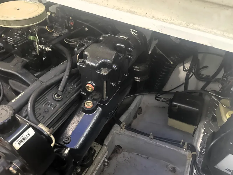 Slide: The Image of Engine compartment of a 1993 Regal Ambassador 233 boat, showcasing mechanical components. - 39