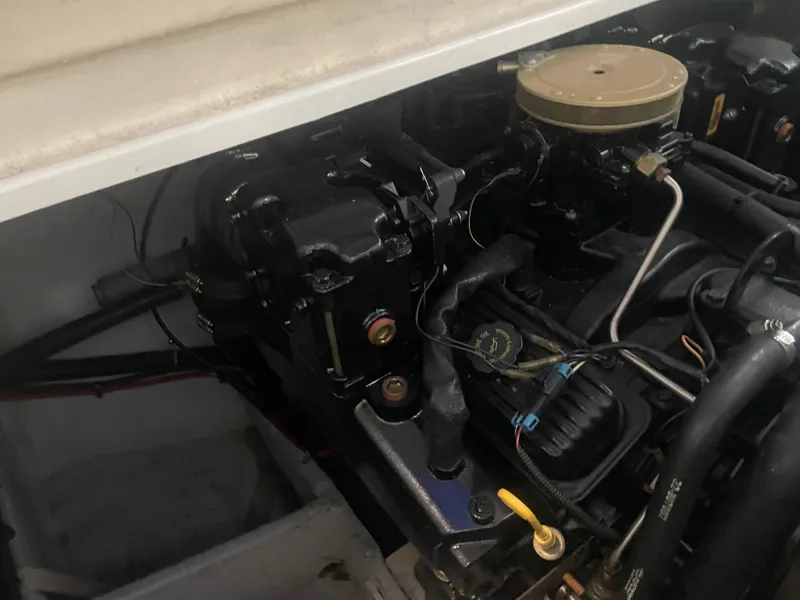 Slide: The Image of Engine compartment of a 1993 Regal Ambassador 233 boat, showcasing mechanical components. - 40