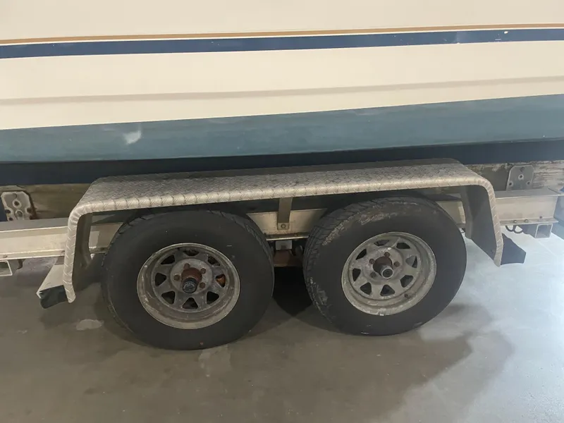 Slide: The Image of Trailer with dual wheels for 1993 Regal Ambassador 233 boat. - 47