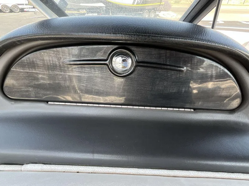 Slide: The Image of 2009 Supra Launch 24 SSV dashboard detail with black leather and wood finish. - 18