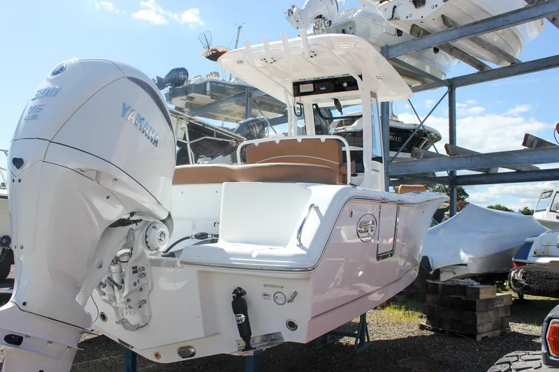 Slide: The Image of 2026 Sea Hunt Ultra 245 SE boat with Yamaha engine on display. - 26
