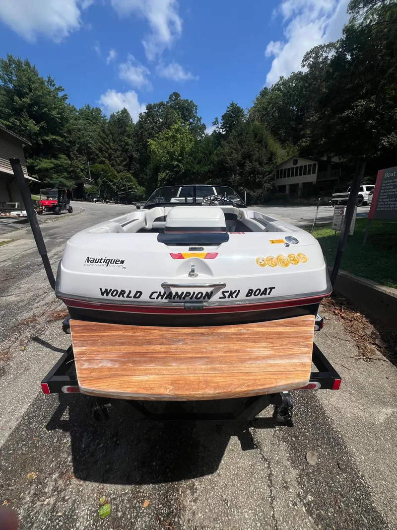Slide: The Image of 1997 Correct Craft Ski Nautique 196, rear view, labeled "World Champion Ski Boat." - 5