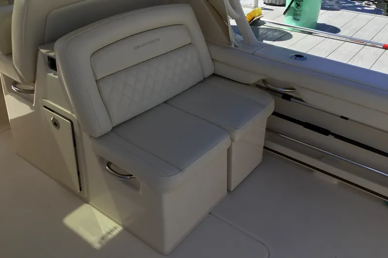 Slide: The Image of 2022 Grady-White Freedom 325 boat interior seating with quilted upholstery. - 55