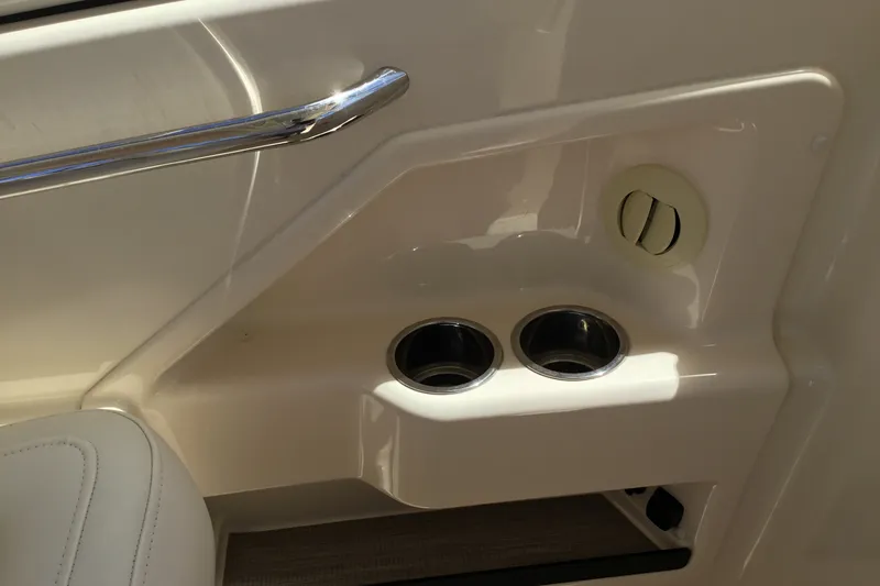 Slide: The Image of Interior detail of 2022 Grady-White Freedom 325 boat with cup holders and handle. - 47