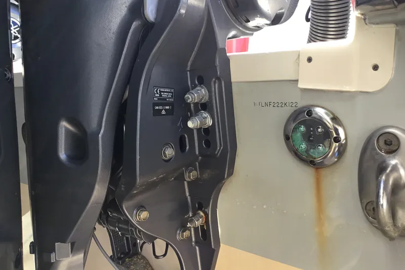 Slide: The Image of Close-up of a 2022 Grady-White Freedom 325 boat engine mount and hull details. - 75