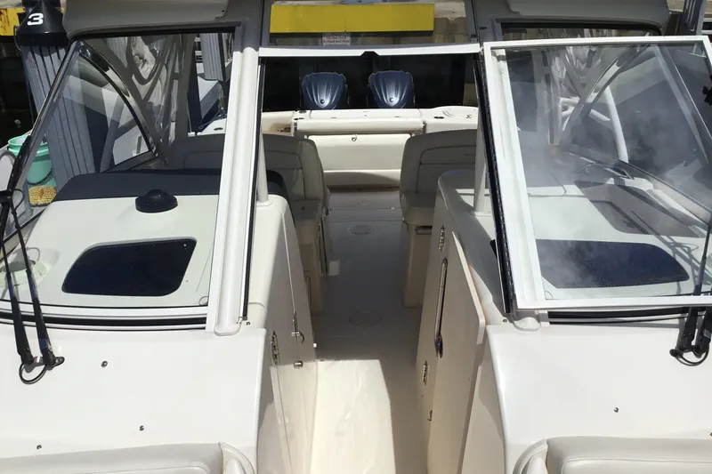 Slide: The Image of 2022 Grady-White Freedom 325 boat interior with open cockpit and seating area. - 25