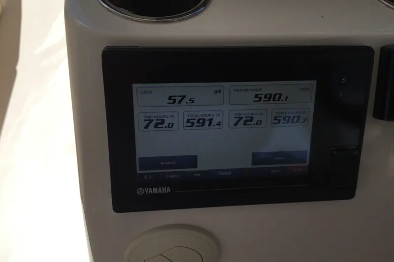 Slide: The Image of Yamaha display on 2022 Grady-White Freedom 325 showing fuel usage and trip data. - 50