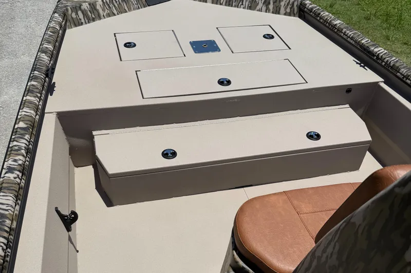 Slide: The Image of Interior of 2026 Avid 20 ROGUE CC boat with storage compartments and seating. - 5