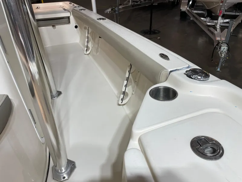 Slide: The Image of 2021 Key West 210 Bay Reef boat interior with stainless steel fixtures and cup holder. - 22