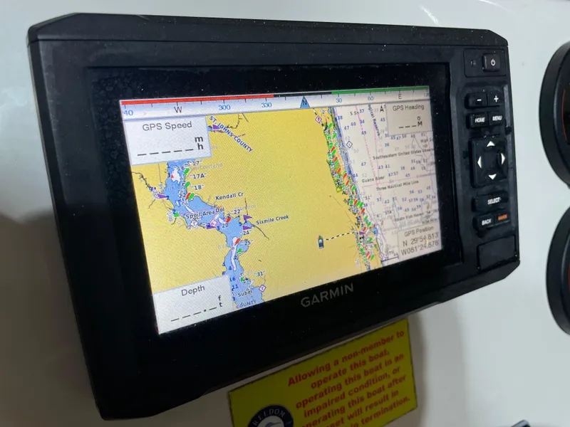 Slide: The Image of Garmin GPS display on 2021 Key West 210 Bay Reef boat, showing navigation map. - 29