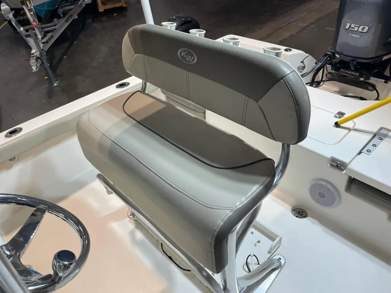 Slide: The Image of Key West 210 Bay Reef 2021 boat seat with steering wheel and Yamaha engine. - 33