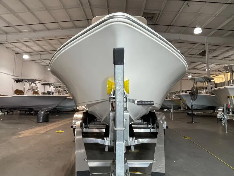 Slide: The Image of 2021 Key West 210 Bay Reef boat on trailer in indoor storage facility. - 4