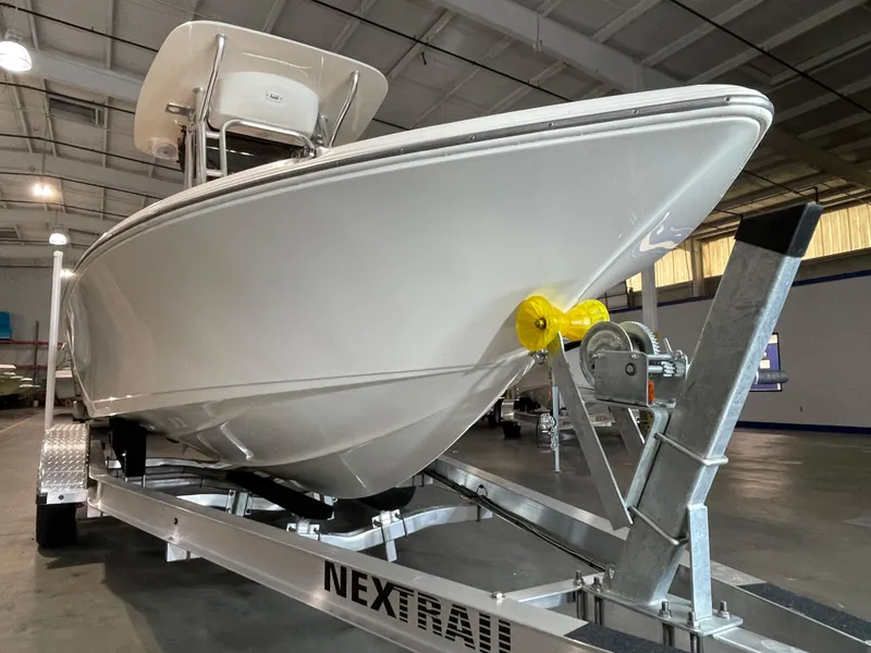 Slide: The Image of 2021 Key West 210 Bay Reef boat on trailer in indoor storage facility. - 5