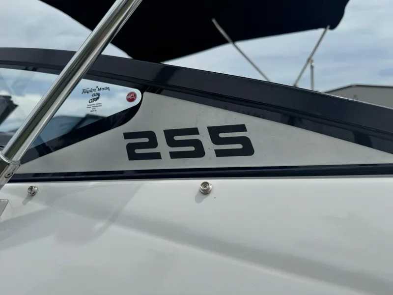 Slide: The Image of 2020 Scarab 255 Open ID boat, close-up of model number on side panel. - 20