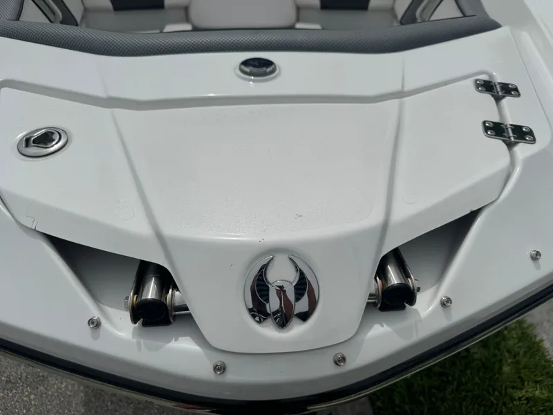 Slide: The Image of 2020 Scarab 255 Open ID boat rear view with sleek design and chrome accents. - 29