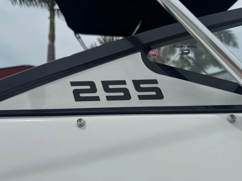 Slide: The Image of Close-up of 2020 Scarab 255 Open ID boat model number on side panel. - 35