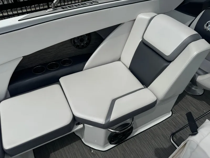 Slide: The Image of 2020 Scarab 255 Open ID boat interior with sleek white and gray seating. - 43