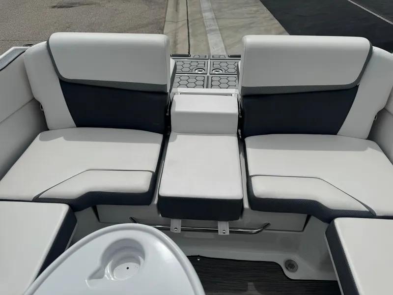 Slide: The Image of 2020 Scarab 255 Open ID boat interior with cushioned seating and sleek design. - 44