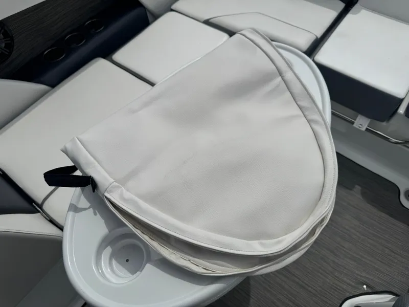 Slide: The Image of White cushion on a 2020 Scarab 255 Open ID boat seat. - 45