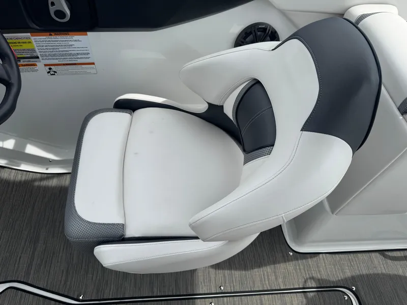 Slide: The Image of 2020 Scarab 255 Open ID boat seat with white and gray upholstery. - 46