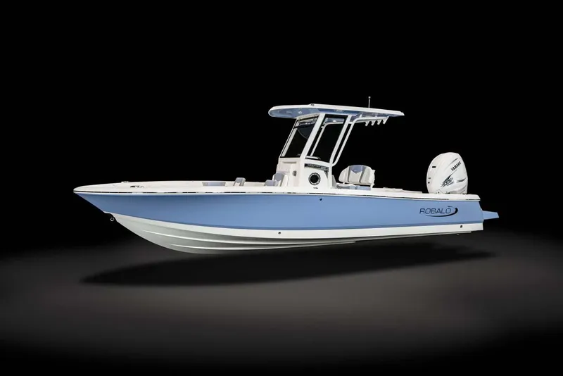 Slide: The Image of Manufacturer Provided Image: 2023 Robalo 266 Cayman boat with blue and white hull on black background. - 21