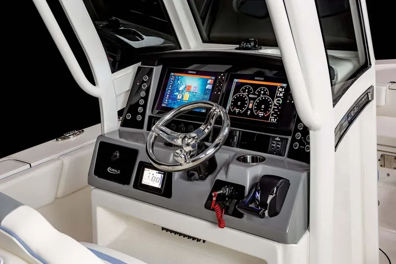 Slide: The Image of Manufacturer Provided Image: 2023 Robalo 266 Cayman boat dashboard with advanced navigation and control systems. - 28