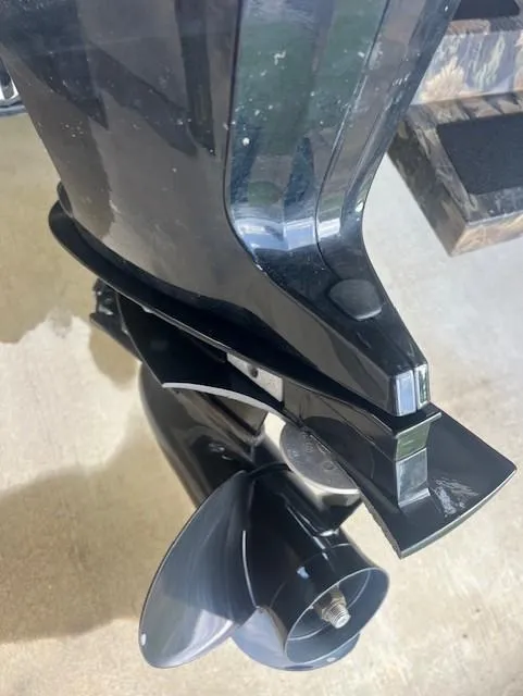 Slide: The Image of 2023 Lowe Roughneck 1860 CC boat motor propeller, close-up view. - 6