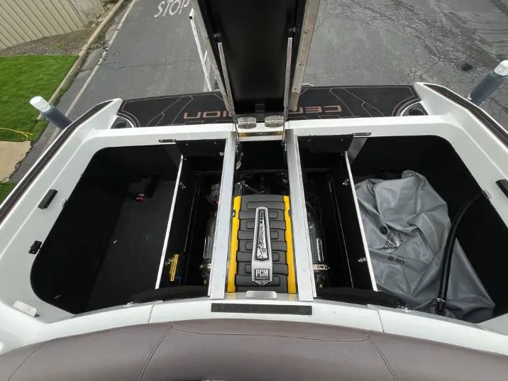 Slide: The Image of Open engine compartment of 2019 Centurion RI 257 boat, showcasing PCM engine. - 11
