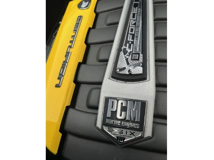 Slide: The Image of 2019 Centurion RI 257 engine cover with PCM marine engines branding. - 14