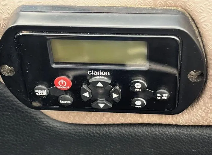 Slide: The Image of Clarion audio control panel in a 2019 Centurion RI 257 boat. - 26