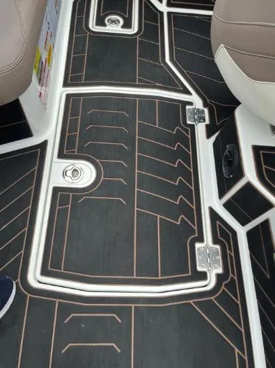 Slide: The Image of Flooring of a 2019 Centurion RI 257 boat with sleek, modern design and secure fittings. - 31