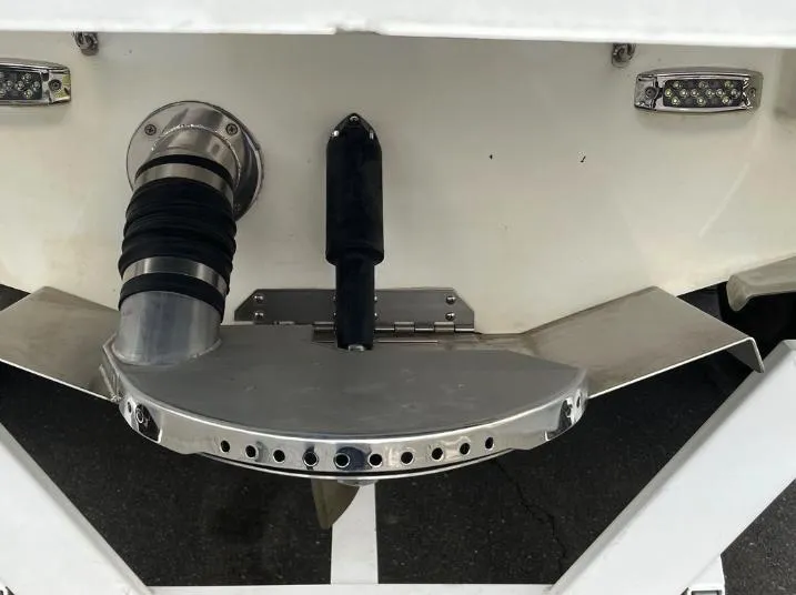 Slide: The Image of Rear view of a 2019 Centurion RI 257 boat with exhaust and trim tab. - 4