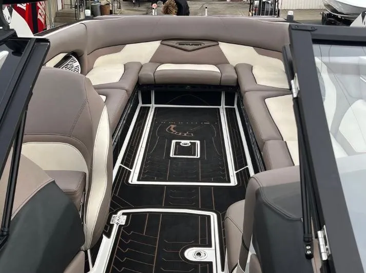 Slide: The Image of 2019 Centurion RI 257 boat interior with luxurious seating and sleek design. - 40