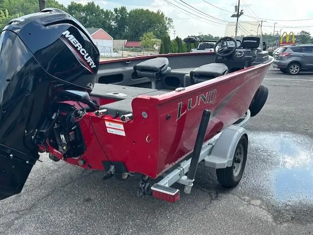 Slide: The Image of 2022 Lund 1775 Adventure SS boat with Mercury engine on a trailer. - 2