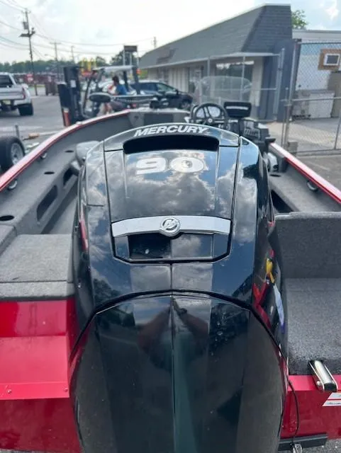 Slide: The Image of 2022 Lund 1775 Adventure SS boat with Mercury engine, parked outdoors. - 5