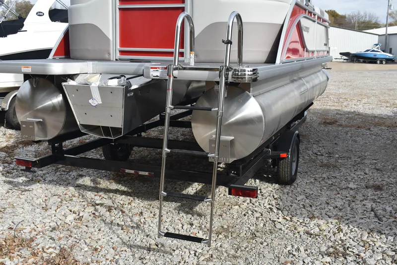 Slide: The Image of 2025 Godfrey Sweetwater 2086 SB pontoon boat on trailer with ladder, rear view. - 8