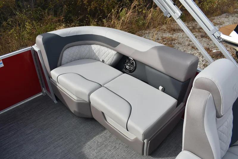 Slide: The Image of 2025 Godfrey Sweetwater 2086 SB boat interior with gray cushioned seating. - 9