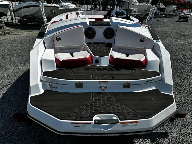 Slide: The Image of 2023 Scarab 165ID Jet Boat, rear view, featuring sleek design and comfortable seating. - 3