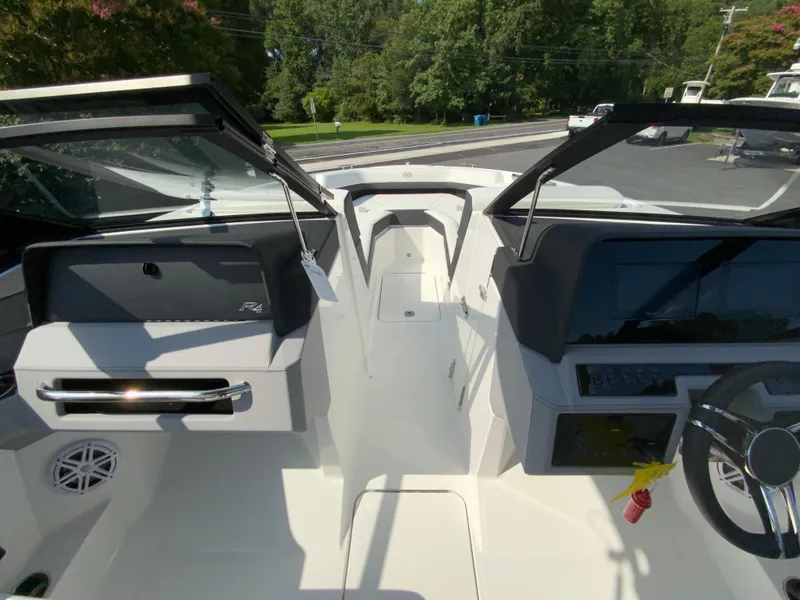 Slide: The Image of 2026 Cobalt R4 OB boat interior with sleek dashboard and modern controls. - 24