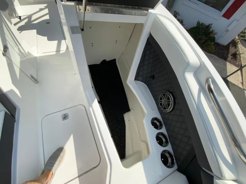 Slide: The Image of 2026 Cobalt R4 OB boat interior with sleek white design and modern features. - 26