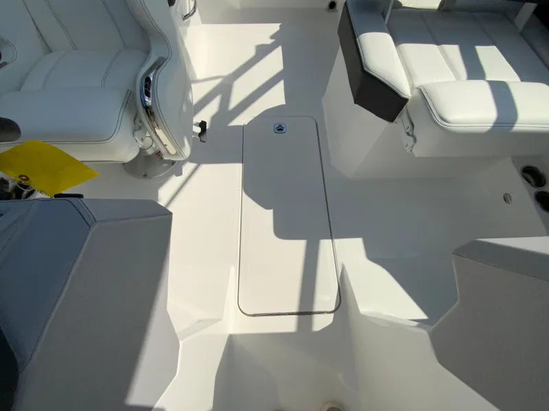Slide: The Image of 2026 Cobalt R4 OB boat interior with white seating and sleek design. - 29