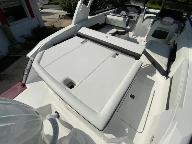 Slide: The Image of 2026 Cobalt R4 OB boat interior with sleek white seating and modern design. - 32