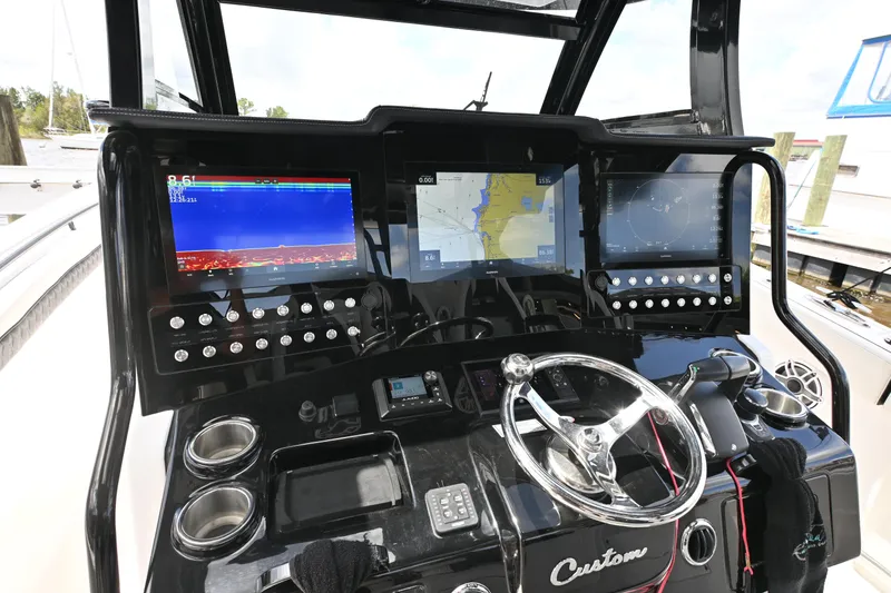 Slide: The Image of Seakeeper 3 stabilizer in 2023 Tidewater 380 CC Adventure boat compartment. - 14