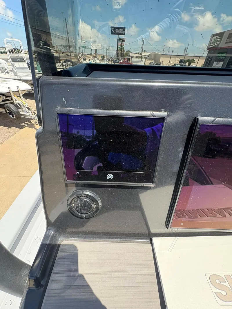 Slide: The Image of Control panel of 2022 JH Performance Outlaw 250 boat with digital display. - 20