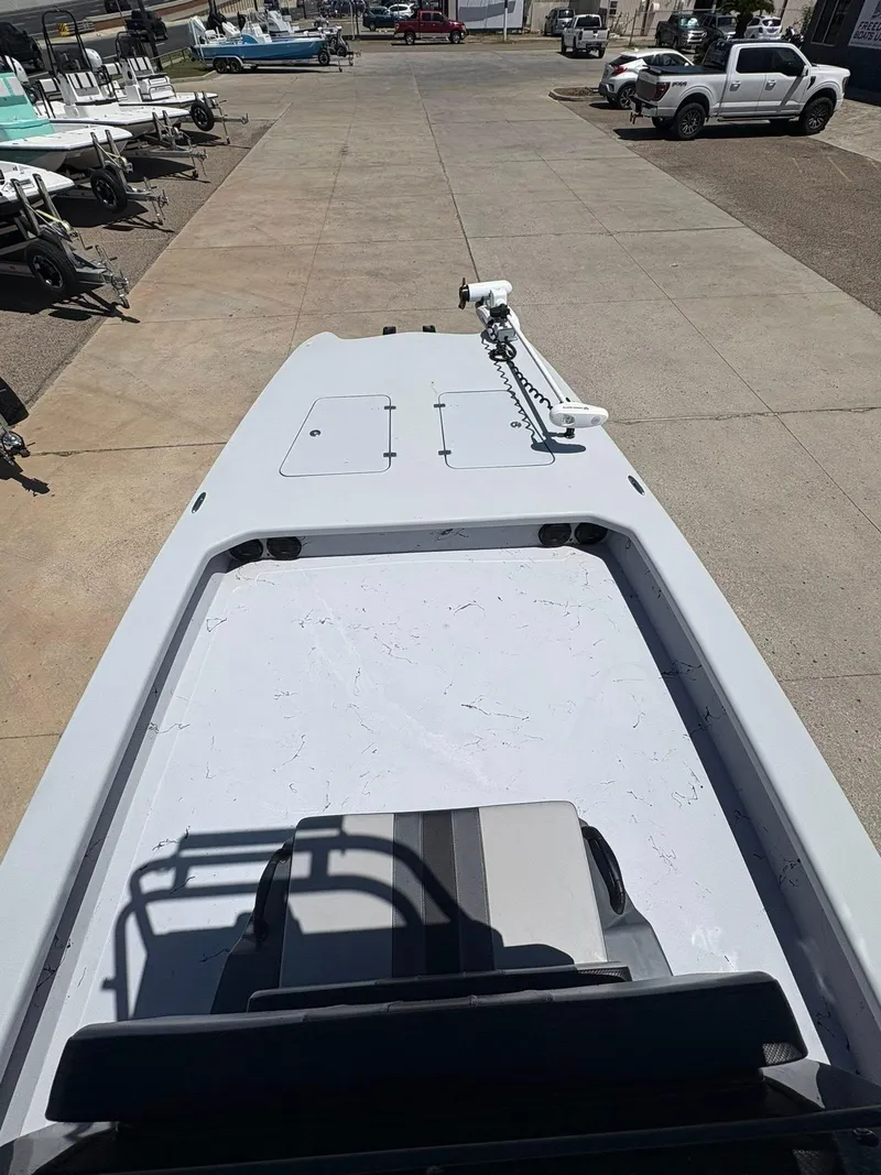 Slide: The Image of 2022 JH Performance Outlaw 250 boat on display in a dealership lot. - 21