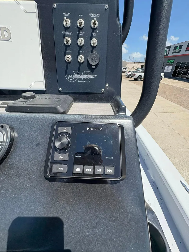 Slide: The Image of Control panel of 2022 JH Performance Outlaw 250 boat with Hertz audio system. - 6