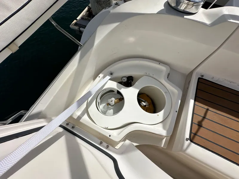 Slide: The Image of Hunter 38 sailboat deck detail, 2008 model, featuring cup holders and teak flooring. - 29
