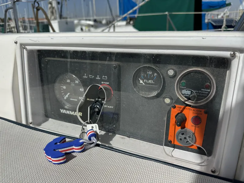 Slide: The Image of Control panel of a 2008 Hunter 38 sailboat with Yanmar engine gauges. - 31