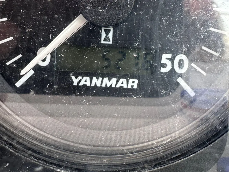Slide: The Image of Yanmar gauge displaying 527 hours on a 2008 Hunter 38 boat. - 32